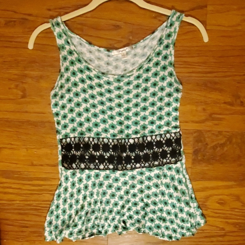 Green sleeveless blouse with green flowers
